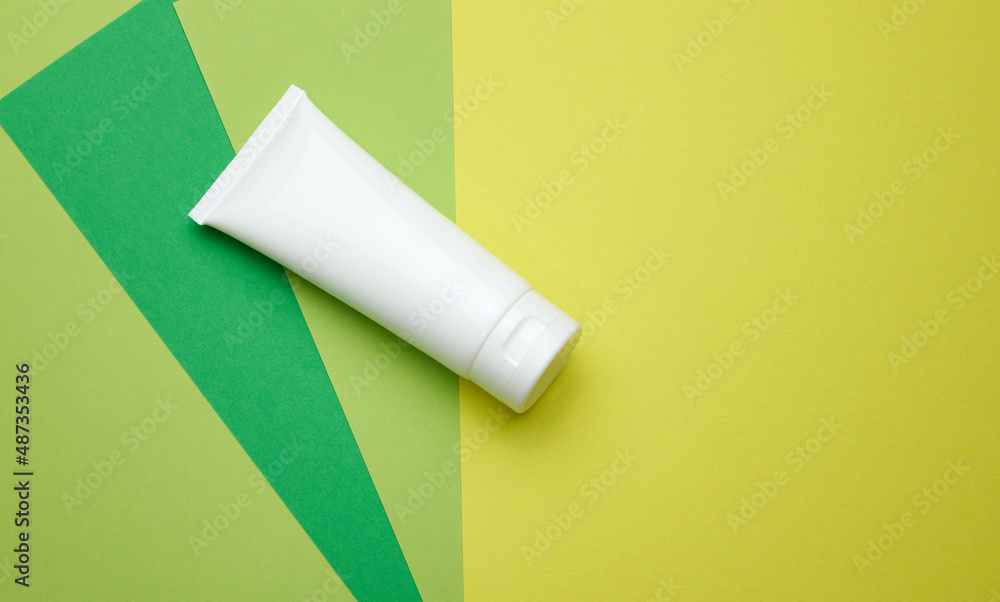 empty white plastic tubes for cosmetics. Packaging for cream, gel, serum, advertising and product promotion, mock up empty white plastic tubes for cosmetics. Packaging for cream, gel, serum, advertising and product promotion, mock up