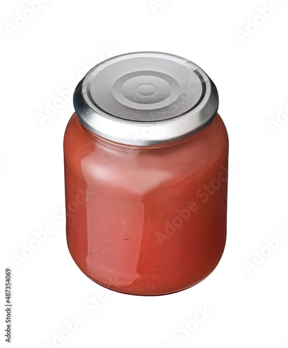 applesauce of pomegranate in jar isolated