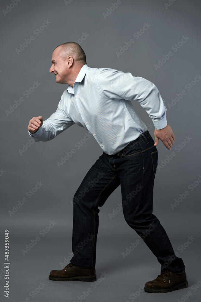 Senior businessman ready to race Senior businessman ready to race