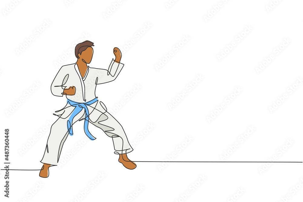 One continuous line drawing of young talented karateka man train pose for duel fighting at dojo gym center. Mastering martial art sport concept. Dynamic single line draw design vector illustration