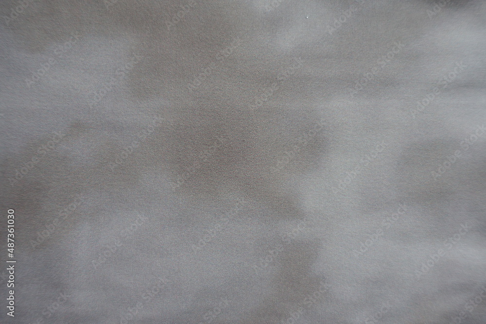 Naklejka premium Swatch of viscose and polyester fabric with tie dye pattern in shades of gray