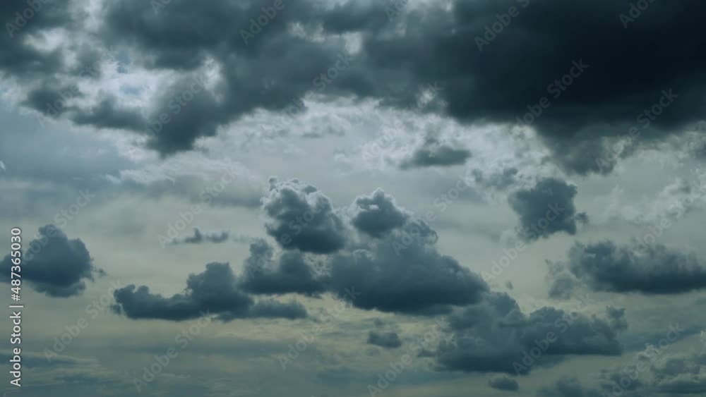Soaring Stormy Black Gray Cumulus Clouds in Rays of Sun, Beautiful Time Lapse, Slow Motion. Summer Cloudy Skyscraper with Rain Clouds in Sunlight, Timelapse. Soaring Stormy Black Gray Cumulus Clouds in Rays of Sun, Beautiful Time Lapse, Slow Motion. Summer Cloudy Skyscraper with Rain Clouds in Sunlight, Timelapse.