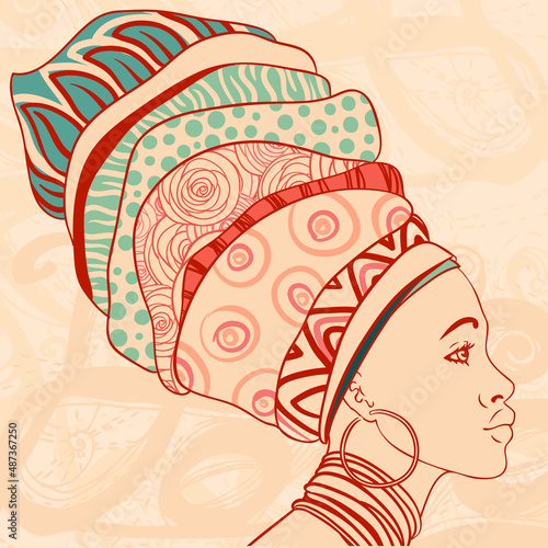 Portrait of beautiful African woman with earring (profile view)
