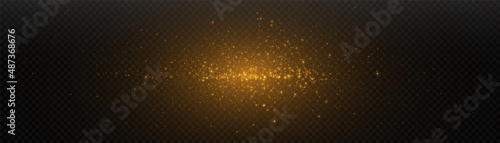 Glowing light effect in yellow gold color with lots of shiny particles isolated on dark background. Vector star cloud with dust.