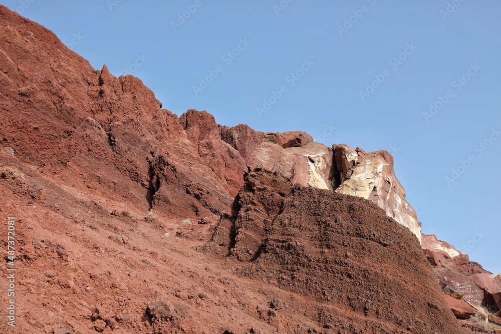 The volcanic landscape of the red beach in Santorini Greece