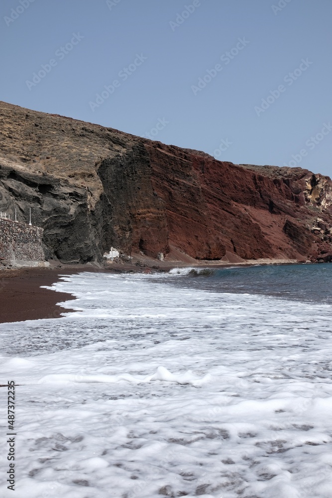 Panoramic view of the famous red beach on a windy day in Santorini 