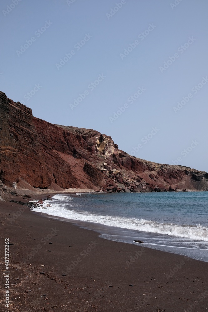 Panoramic view of the famous red beach on a windy day in Santorini 