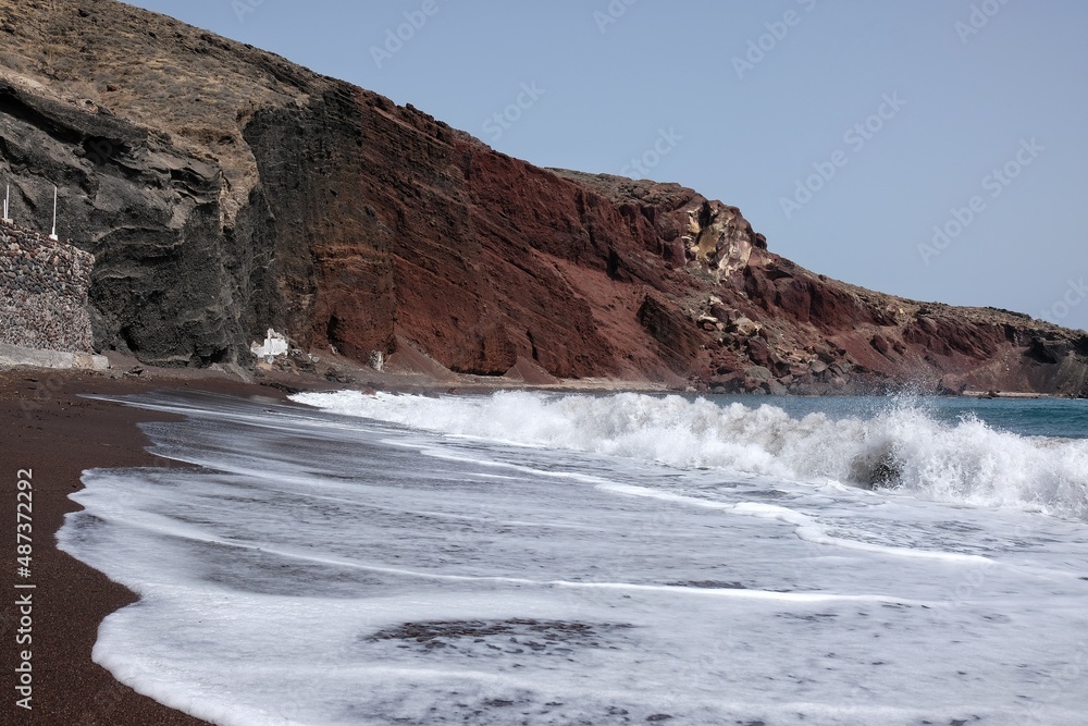 Panoramic view of the famous red beach on a windy day in Santorini 