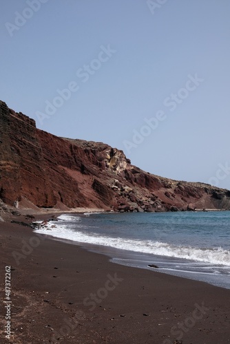 Panoramic view of the famous red beach on a windy day in Santorini 