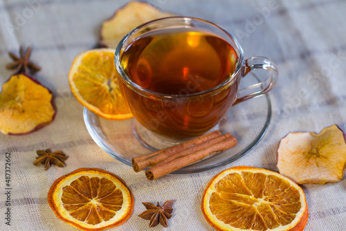 Cup of tea and slices of dried orange