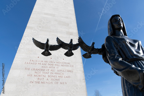 Netherlands,Limburg,Margraten, february 12 2022: Memorial tower at the American Cemetery and Memorial in Margraten,the Netherlands, the statue portrays a mourning mother