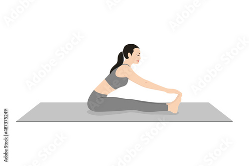 Staff Hand To Big Toe Pose I. Beautiful girl practice Padangustha Dandasana I. Young attractive woman practicing yoga exercise. working out, black wearing sportswear, grey pants and top, indoor full