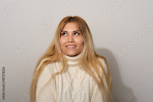 Asian woman on a gray background