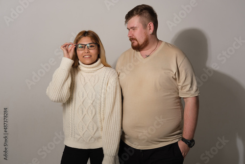 Man and woman on a gray background