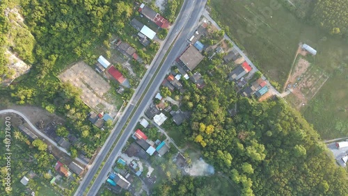 aerial view of road and home,beautiful nature in the morning,shot from top view,move the camera angle upwards