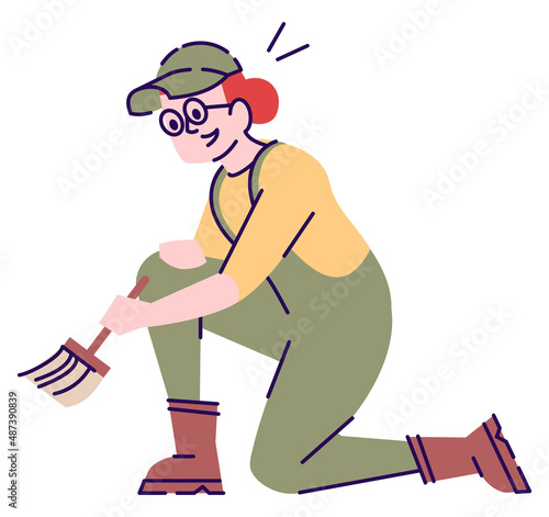 Female archaeologist with brush semi flat RGB color vector illustration. Sitting figure. Person with experience in archaeological field isolated cartoon character on white background