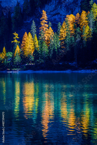 Autumn and golden reflections on Lake Braies. Park of the Dolomites. © Nicola Simeoni