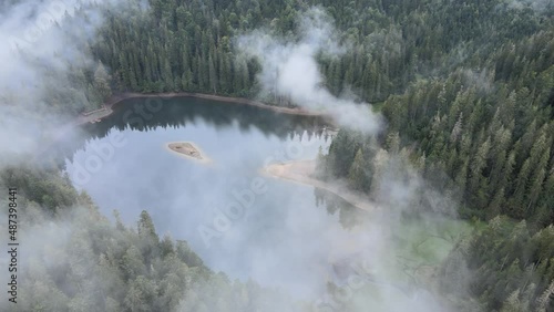 Mysterious and mystical lake Synevyr in the Carpathians, Ukraine photo