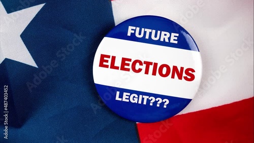 future elections legit text quote on election button laying on the star spangled banner. united states of america concept. photo