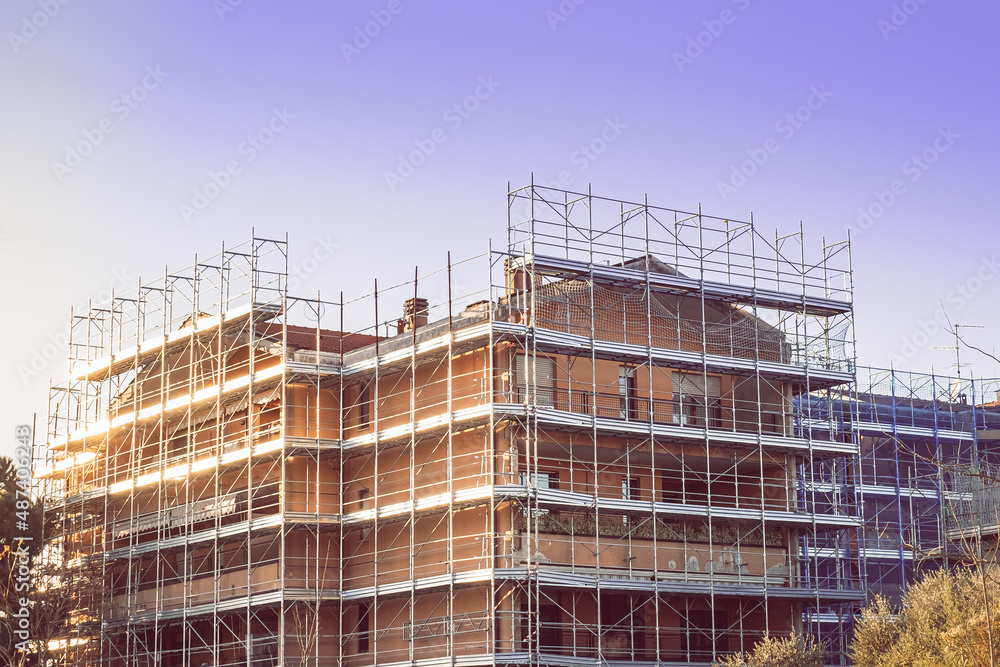 Construction and decoration of the building.Scaffolding and remodeling old building Construction and decoration of the building.Scaffolding and remodeling old building