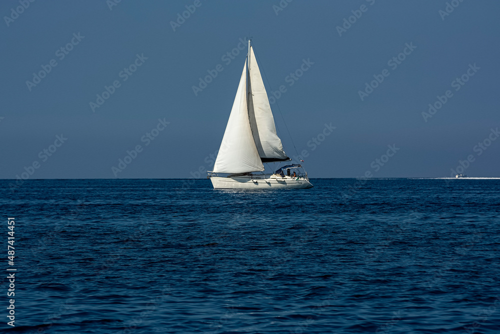 a sailboat in the mediterranean sea