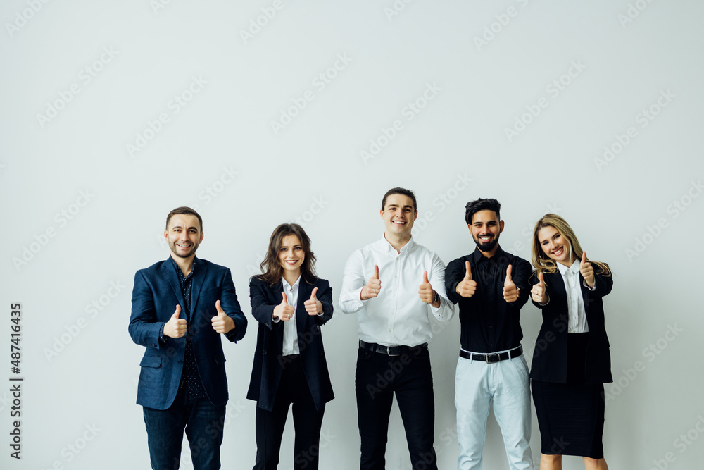 Obraz premium Business leaders with employees group showing thumbs up looking at camera, happy professional multicultural office team people recommend best corporate service, proud or good career, human resource