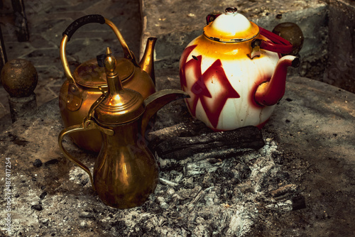 traditional tea on firelogs photo