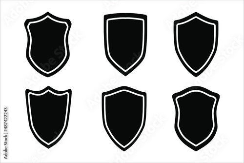 Set of flat shields with contours on white background. Different shields shapes. Security vector icon.