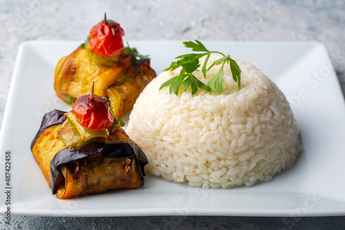 Traditional delicious Turkish food; Kofte kebab wrapped in eggplant (Turkish name; Islim - islim kebabi or kurdan kebabi) photo