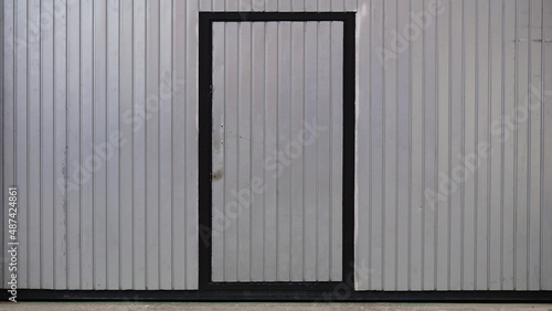 warehouse metal industrial door entrance © Esteve