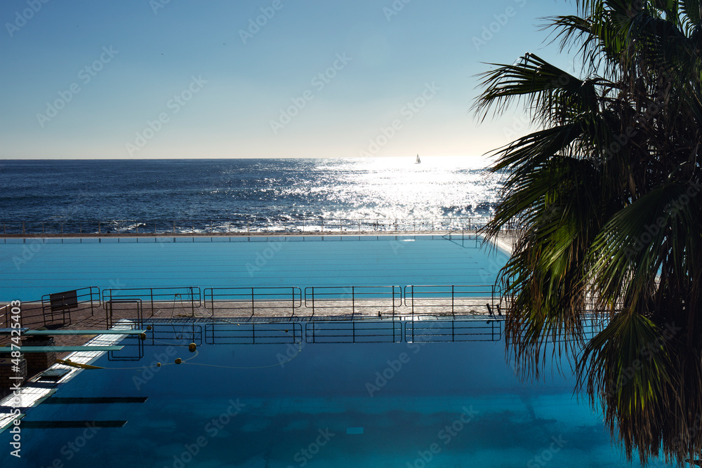 Outdoor swimming pool with amazing ocean view Premium Photo