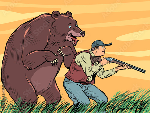 A huge bear and a hunter, a funny scene. a predator has crept up on a man