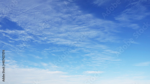 WIspy clouds and blue sky suitable for background
