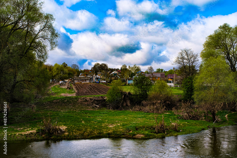 Landscape with the image of a russian summer river countryside