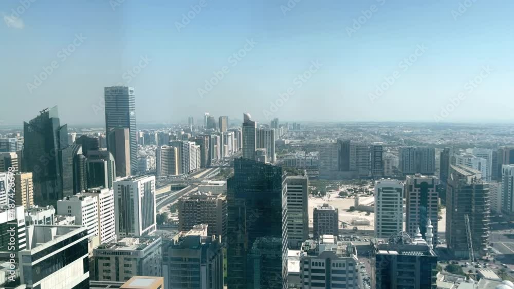 Aerial Timelapse high view of Abu Dhabi city (UAE) - Downtown Abu Dhabi landmarks - corniche road and beach Aerial Timelapse high view of Abu Dhabi city (UAE) - Downtown Abu Dhabi landmarks - corniche road and beach