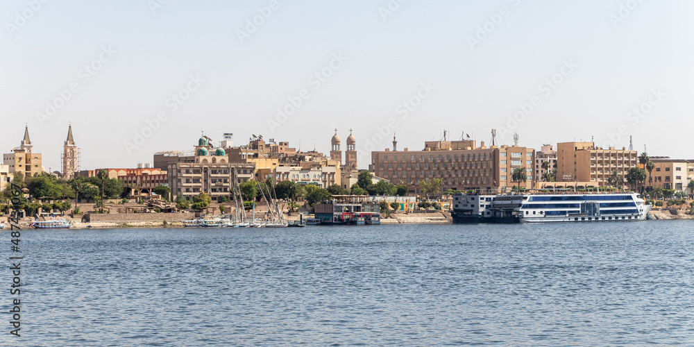 Luxor, Egypt - September 21, 2021: River Nile Luxor in Egypt. A beautiful tourist city on the background. Luxor, Egypt - September 21, 2021: River Nile Luxor in Egypt. A beautiful tourist city on the background.