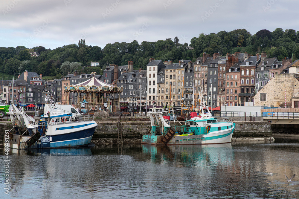 City of Honfleur in Normandy with its typical houses and boat lock in the quay City of Honfleur in Normandy with its typical houses and boat lock in the quay