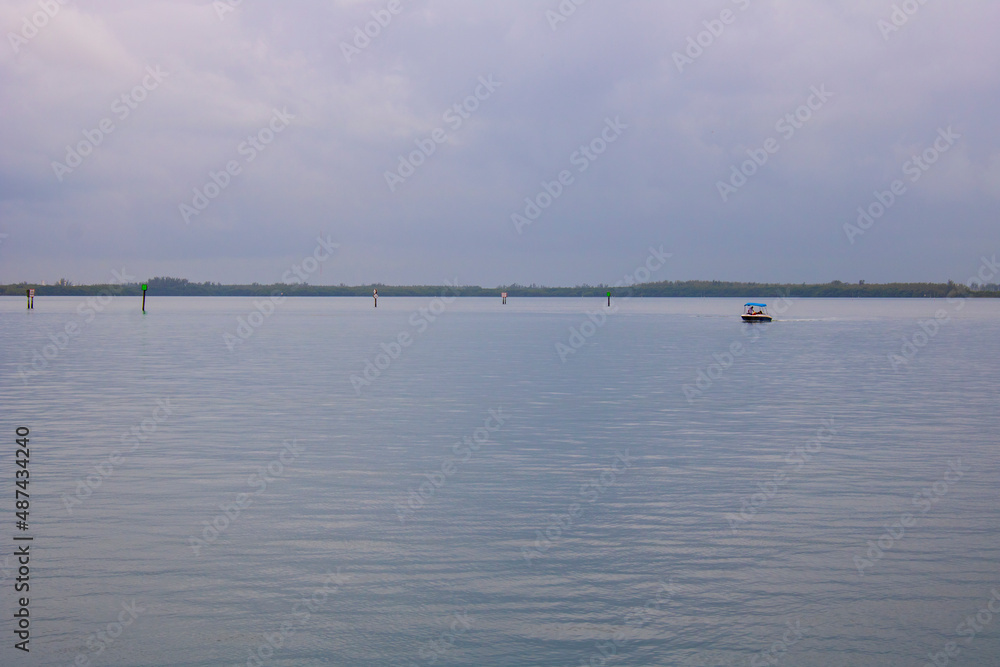 The majesty of a calm sea on a cloudy day in the city of Miami The majesty of a calm sea on a cloudy day in the city of Miami