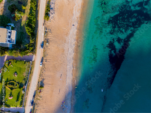 Aerial drone view of beautiful Agios georgios pagon beach in kerkyra , corfu , greece