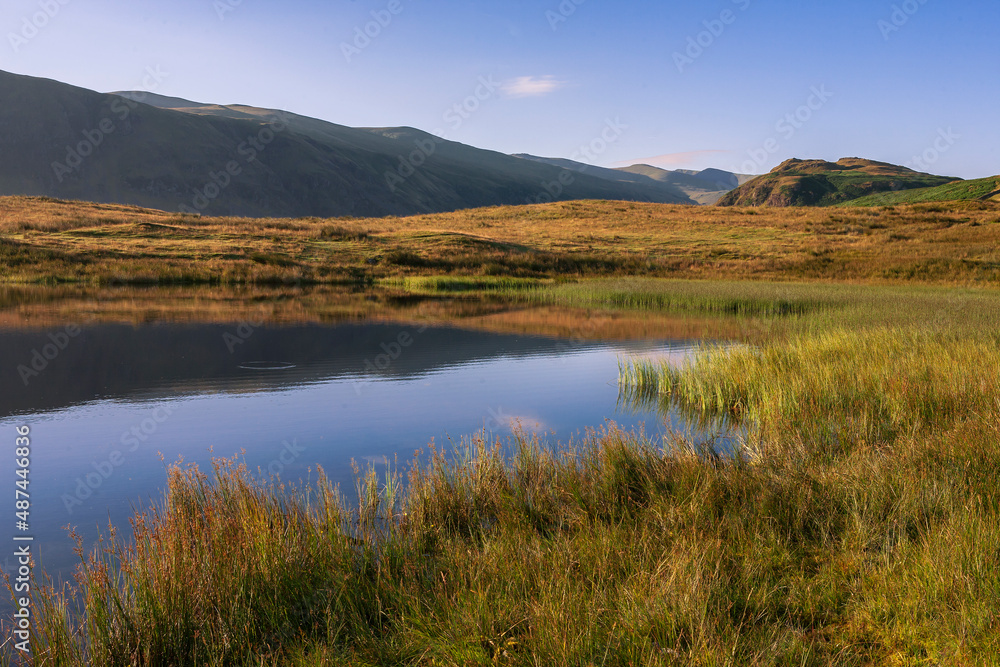 A peaceful early Summer's morning at Tewet Tarn and St John's-in-the-Vale, Lake District, Cumbria, UK A peaceful early Summer's morning at Tewet Tarn and St John's-in-the-Vale, Lake District, Cumbria, UK