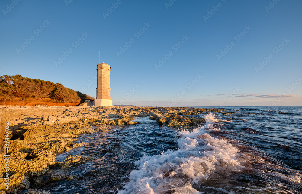 Obraz premium lighthouse at sunset
