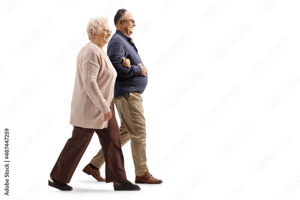 Full length profile shot of an elderly woman walking with a man Stock Photo  | Adobe Stock