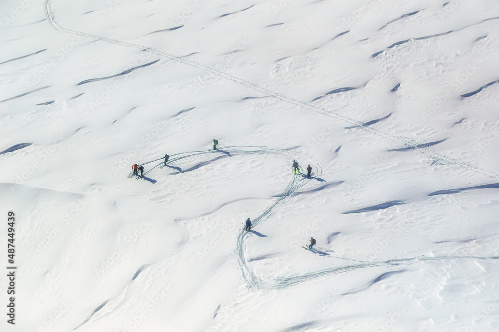 Free ride skiers skiing at off ski slope glacier region in Soelden, Austria.