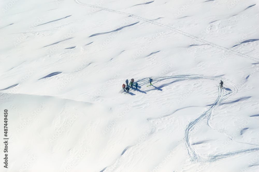 Free ride skiers skiing at off ski slope glacier region in Soelden, Austria.