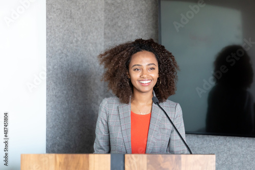 Woman speaking in a conference room