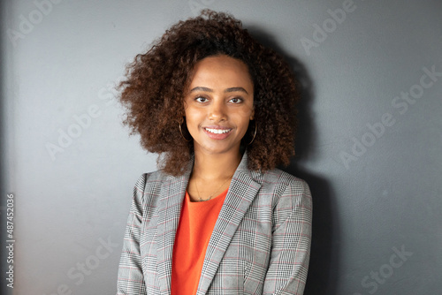portrait of a woman with curly hair