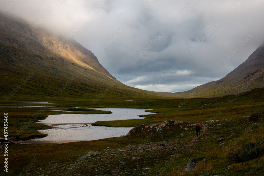 Sunrise in the U-valley on a rainy day, Kungsleden trail, Swedish Lapland Sunrise in the U-valley on a rainy day, Kungsleden trail, Swedish Lapland