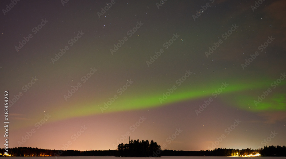 The Northern Lights on a lake in Finland. The Northern Lights on a lake in Finland.
