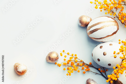 easter holidays background with golden eggs photo