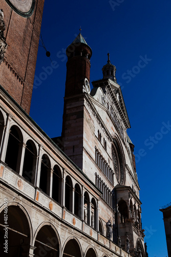 Cremona Cathedral in Cremona, Lombardy is a Catholic church in northern Italy with the white marble statues, the bell tower (Torrazzo) and the seat of the Bishop of Cremona. European architecture.